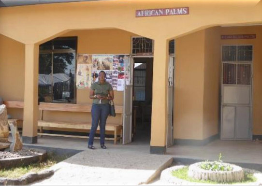 Outside FMG safehouse in the Mara region, project funded by African Palms, selling palm crosses
